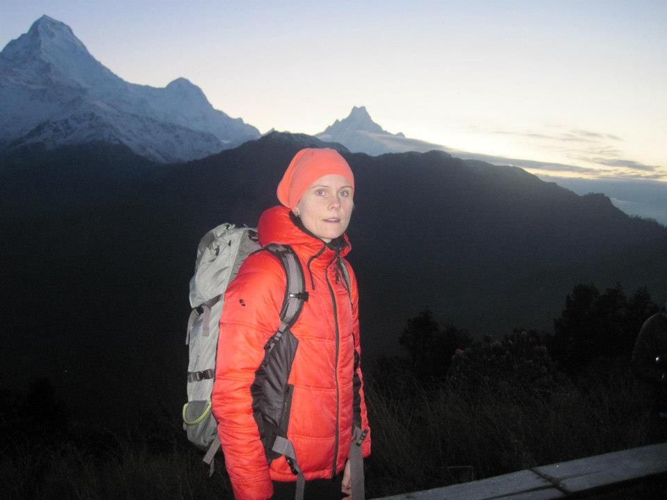 trekker wearing a red jacket